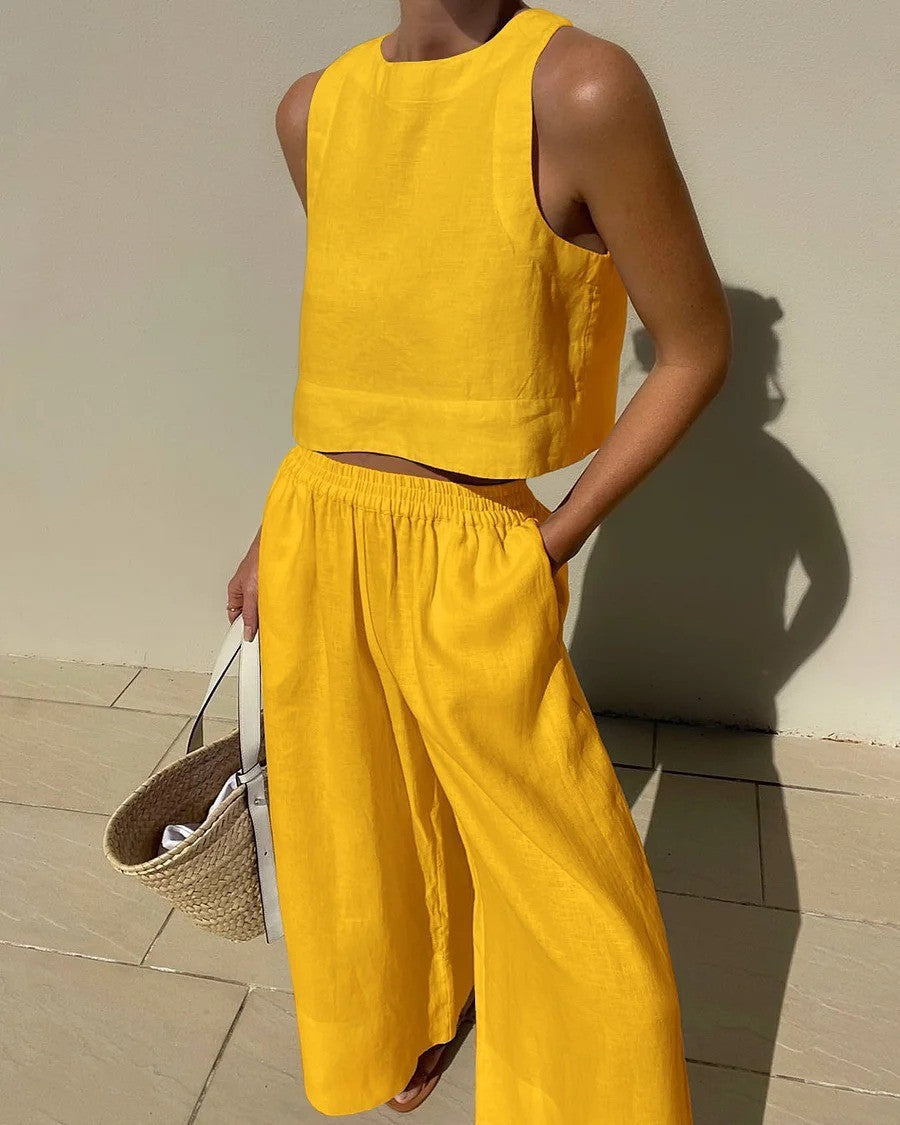 Effortless women's two-piece set: sleeveless top & comfortable wide-leg capri pants. Summer vacation.
