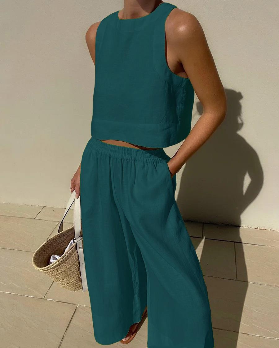 Women's comfortable sleeveless top & wide-leg capri pants. Versatile lounge & vacation set.