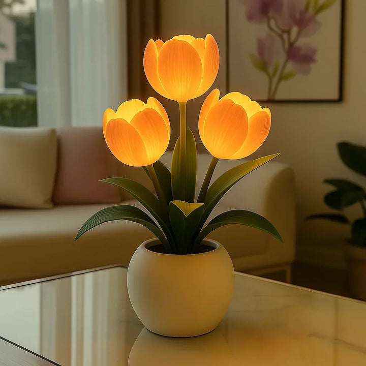 Close-up of a stylish white tulip LED lamp, showcasing its soft, dimmable warm glow.