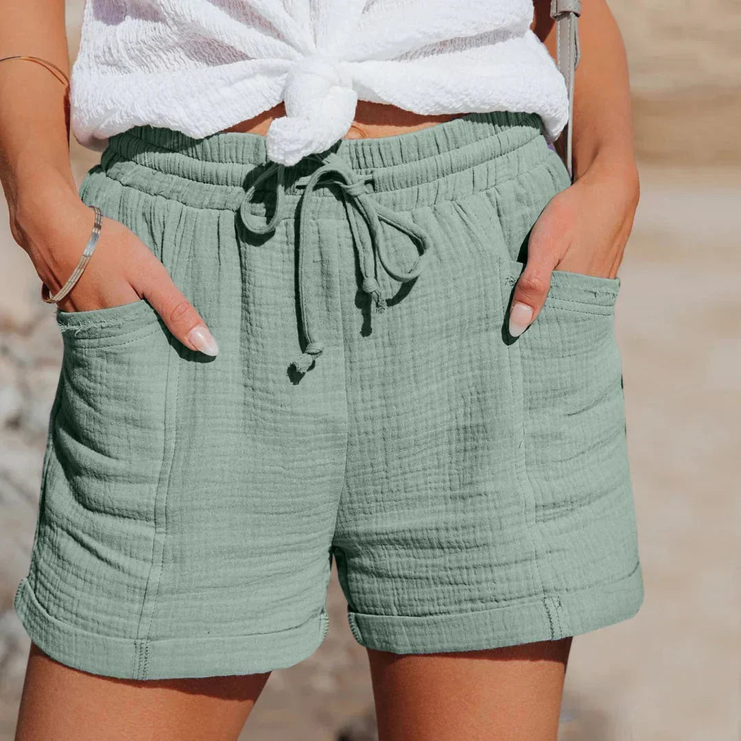 Casual women's relaxed fit shorts. Lightweight fabric, elastic waist for everyday comfort in summer fashion. Womens apparel.
