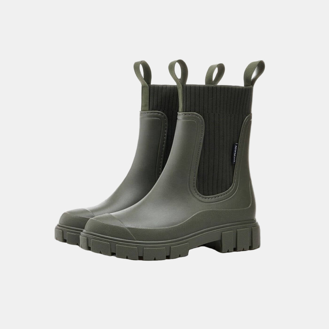 Waterproof women's boots, providing orthopedic support, comfort, and a non-slip design for winter walks.