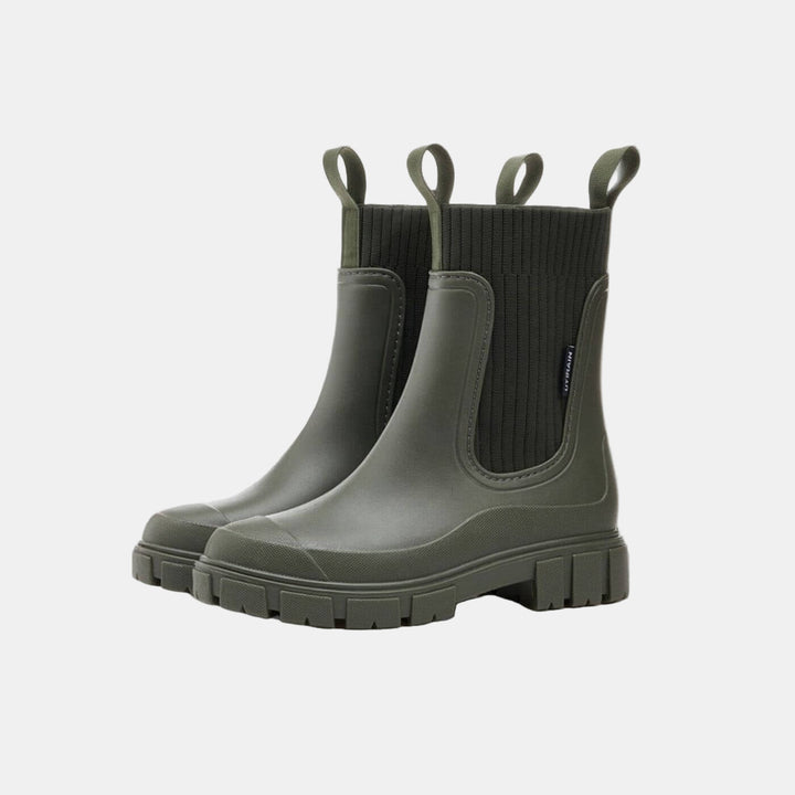 Waterproof women's boots, providing orthopedic support, comfort, and a non-slip design for winter walks.