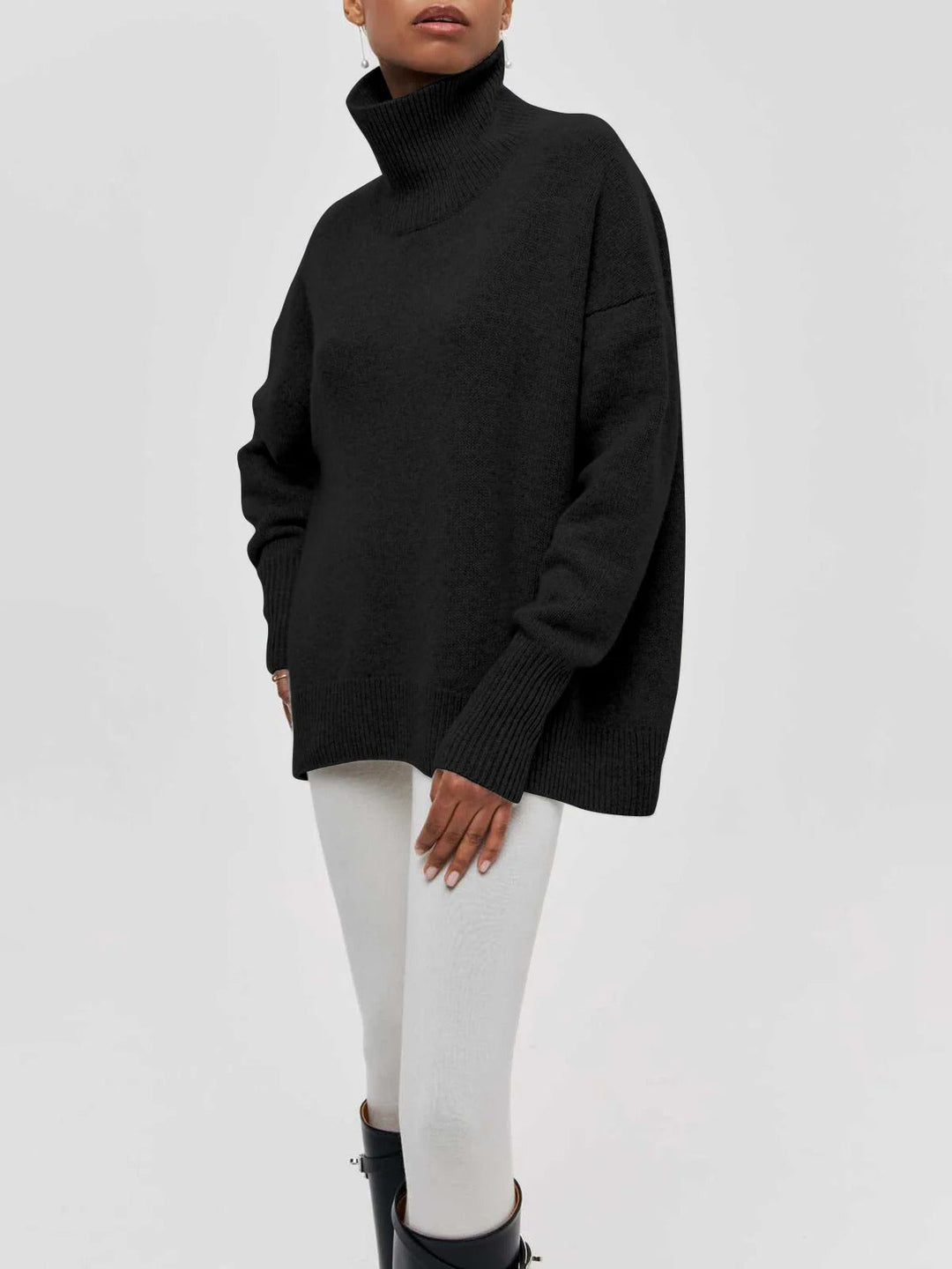 Warm & cozy women's oversized turtleneck sweater, relaxed knit for winter, casual chic style.