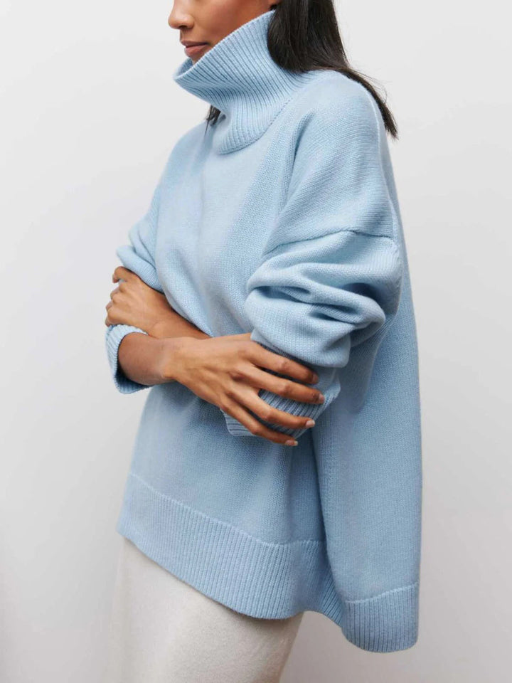 Cozy oversized turtleneck sweater for women, warm winter knit, relaxed fit, perfect for chilly days.