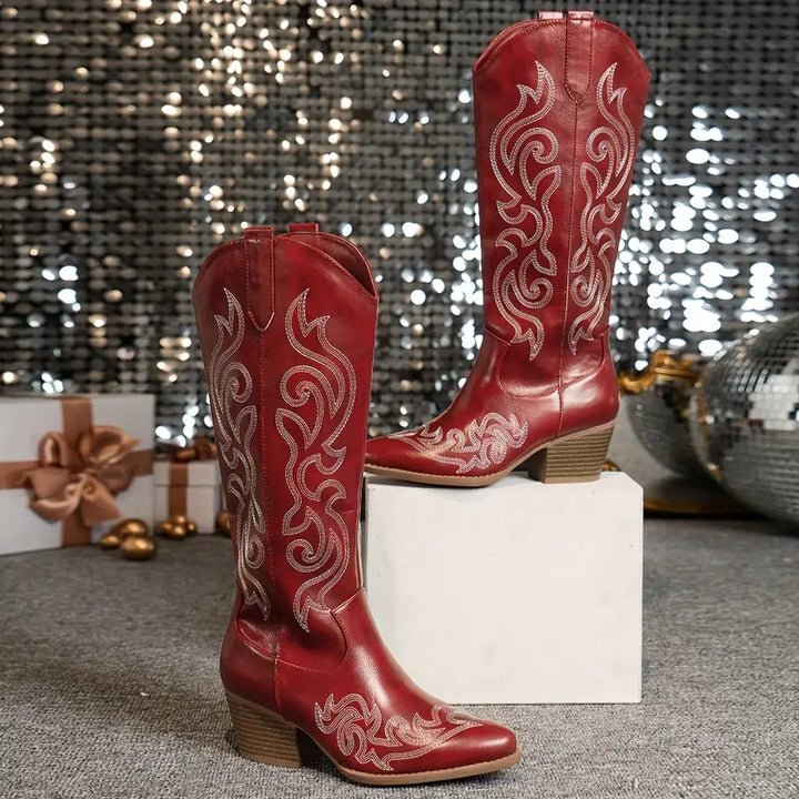 Sleek black pointed toe women's cowboy boots, providing ultimate comfort and a chic look.