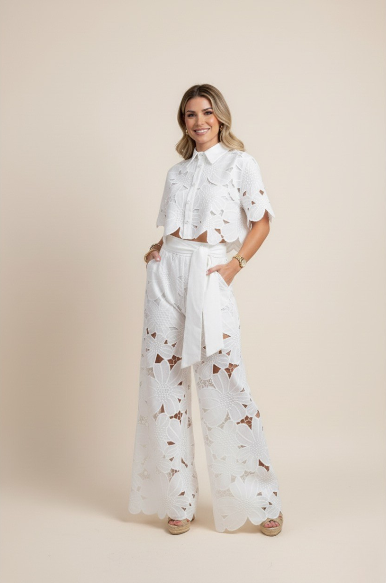 Close-up of delicate floral embroidery on a comfortable women's two-piece wide-leg outfit.