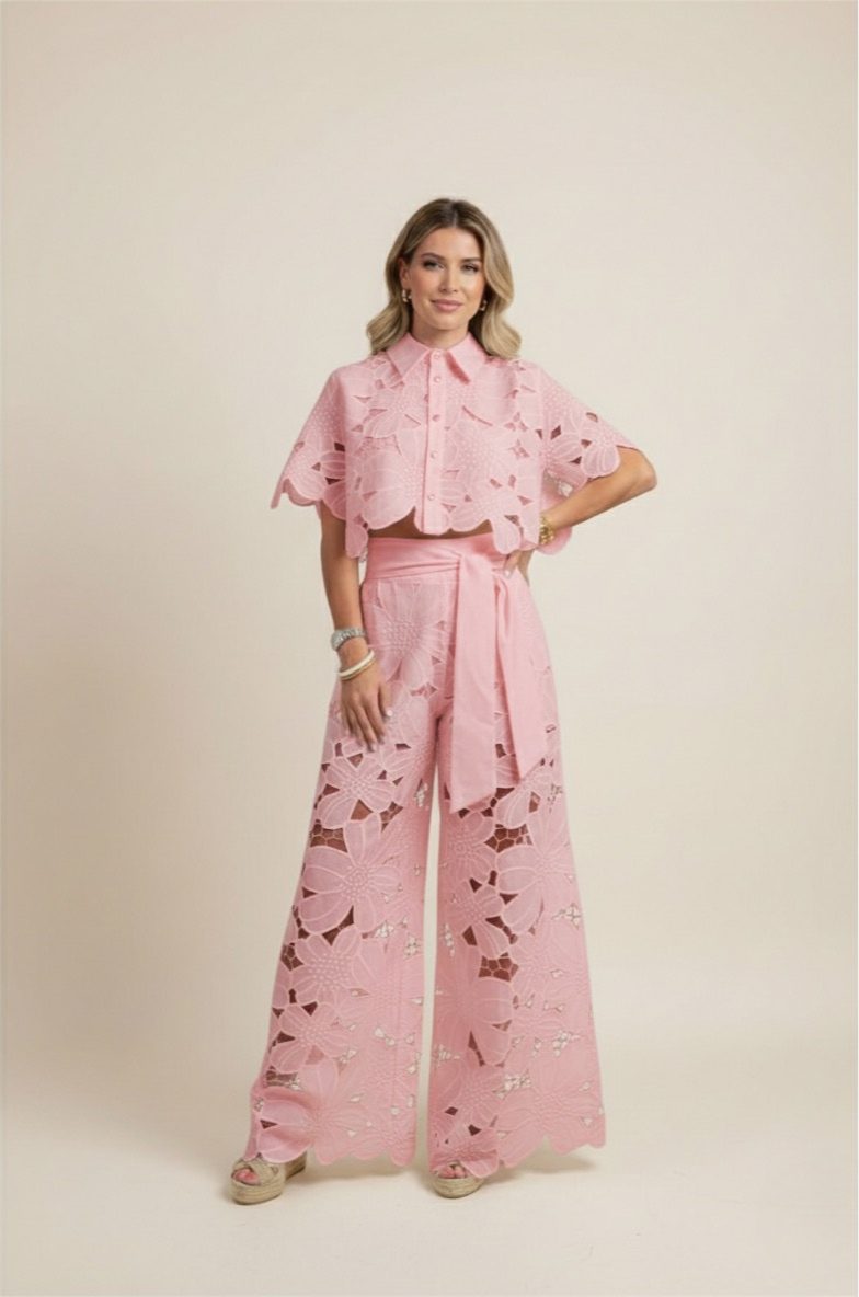 Elegant wide-leg pants with floral embroidery, a key piece of this women's two-piece set.