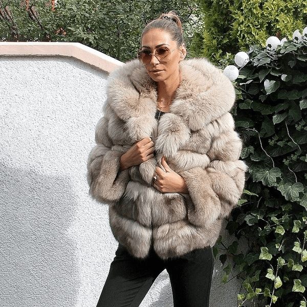 Women's plush oversized hooded teddy jacket, perfect for warm, cozy winter fashion.