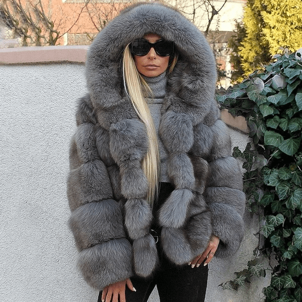 Soft plush oversized teddy jacket for women, hooded design offering cozy, warm winter fashion.