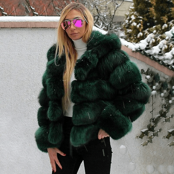 Cozy plush oversized hooded jacket for women, a warm and fashionable teddy outerwear piece.