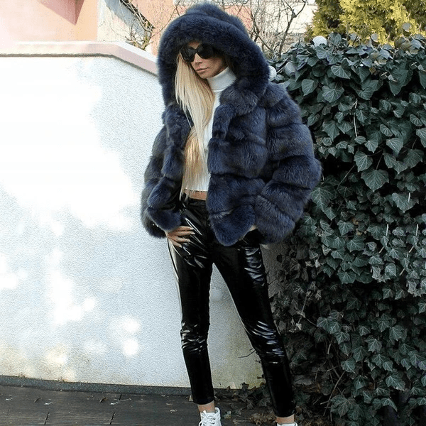 Stylish women's hooded oversized teddy jacket. Plush, warm, and comfortable outerwear for winter days.