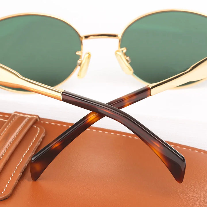Timeless women's oval sunglasses, a fashionable accessory ensuring stylish UV protection.