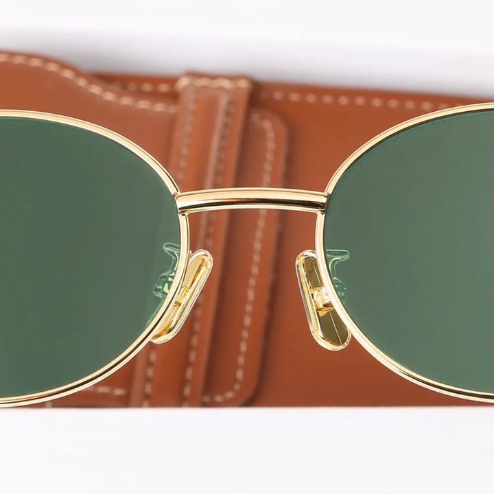 Fashion-forward women's oval eyewear with an elegant design, providing essential UV protection.