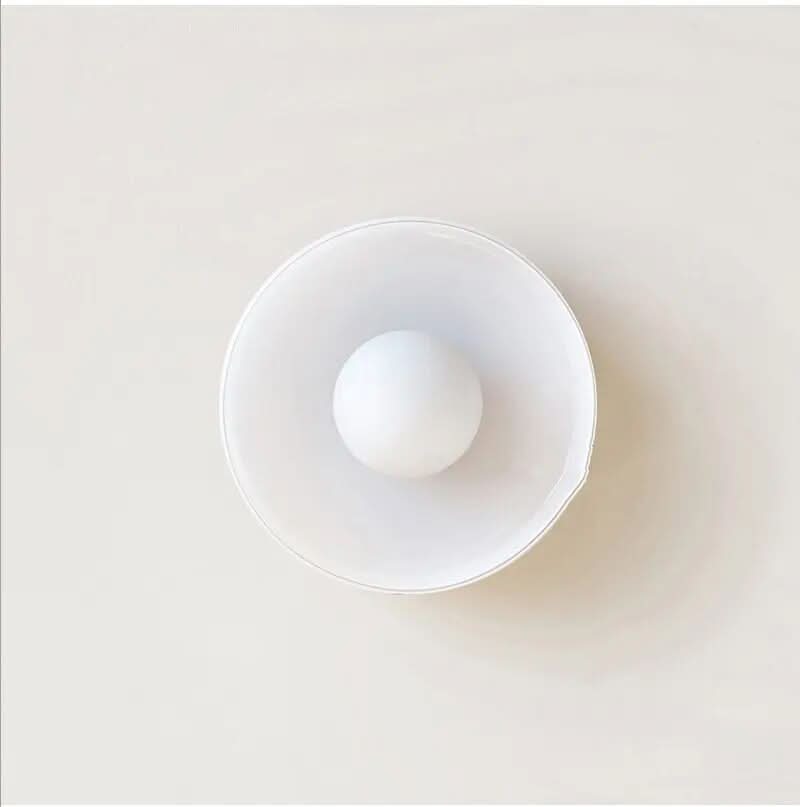Sleek minimalist Scandinavian glass ceiling lamp, perfect for modern indoor lighting.