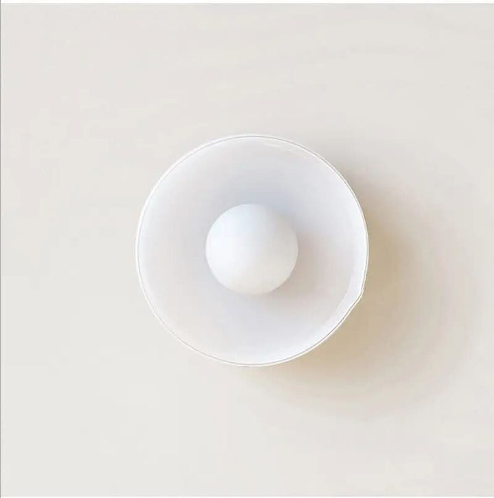 Sleek minimalist Scandinavian glass ceiling lamp, perfect for modern indoor lighting.