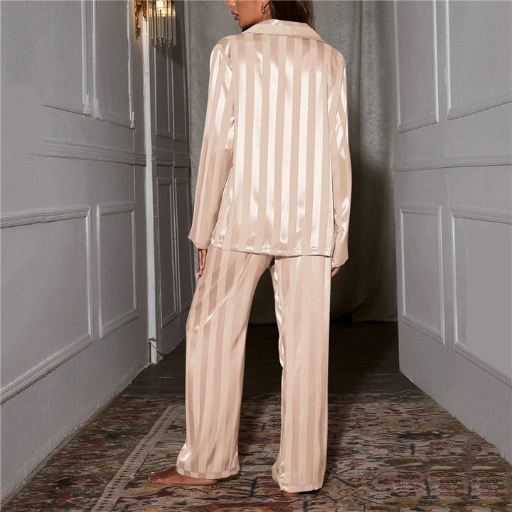 Luxurious soft women's pajama set, two-piece long sleeve top & pants for elegant sleepwear.