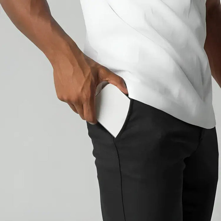 Full view of men's tapered ankle length chinos, modern fit. Stylish smart casual versatile pants for men.