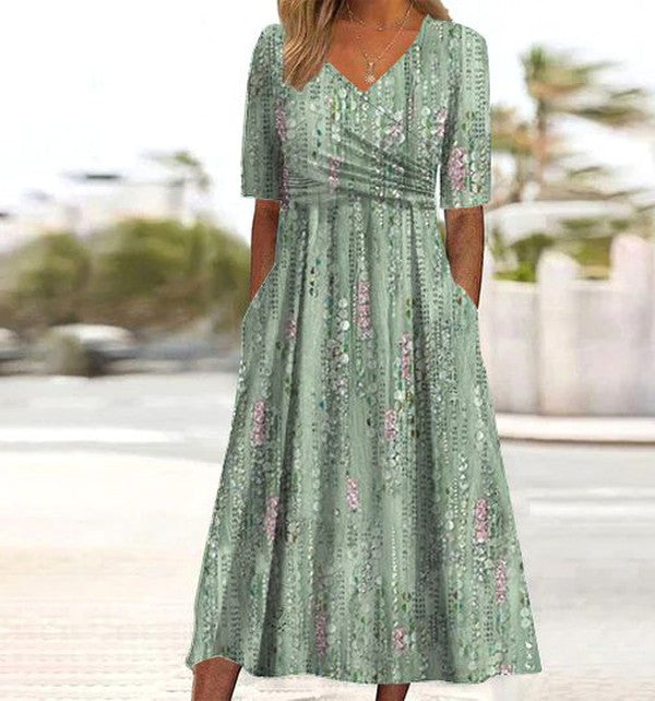 Elegant women's flared midi V-neck summer dress with print, perfect for casual wear or vacation.