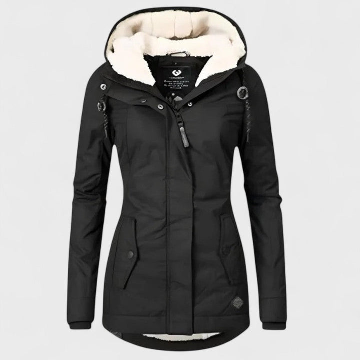 Stylish women's long winter jacket. Elegant waterproof design with cozy hood for cold weather fashion.