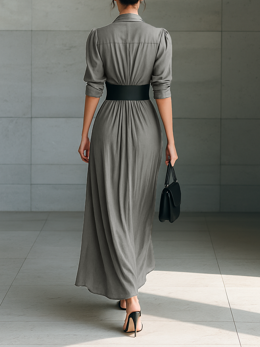 Chic women's grey pleated long dress, a versatile and sophisticated piece for autumn fashion or special occasions.