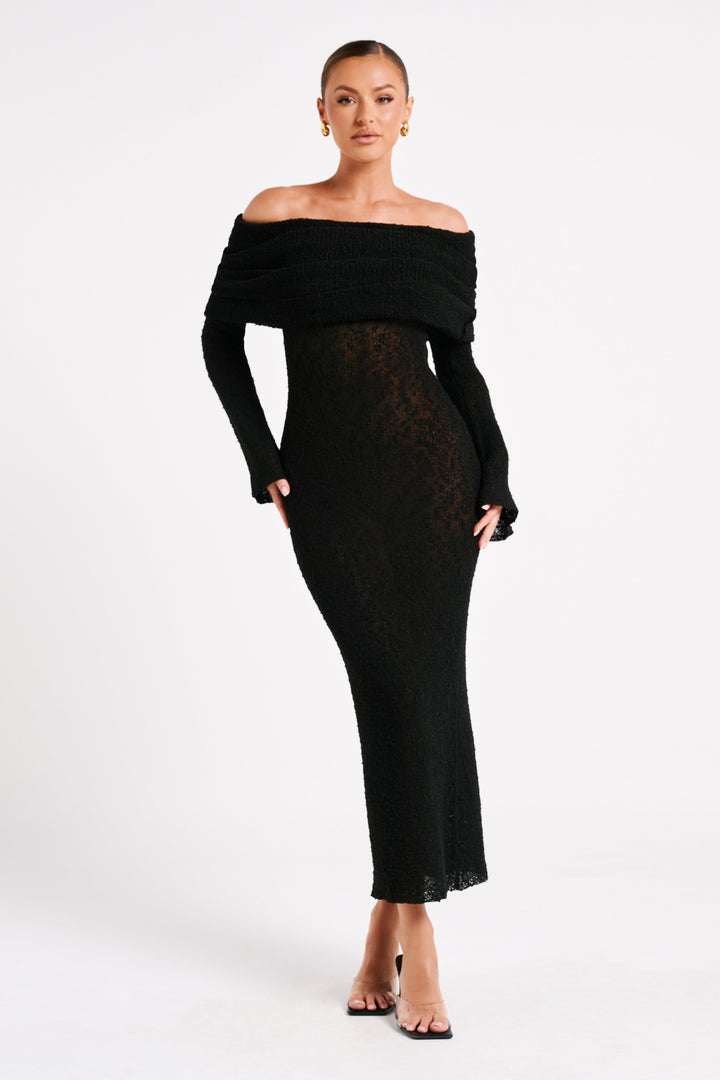 Modern women's elegant off-shoulder maxi dress, perfect for sophisticated evening fashion.