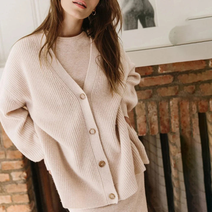 Women's oversized rib-knit long cardigan, a modern open front design for effortless style.