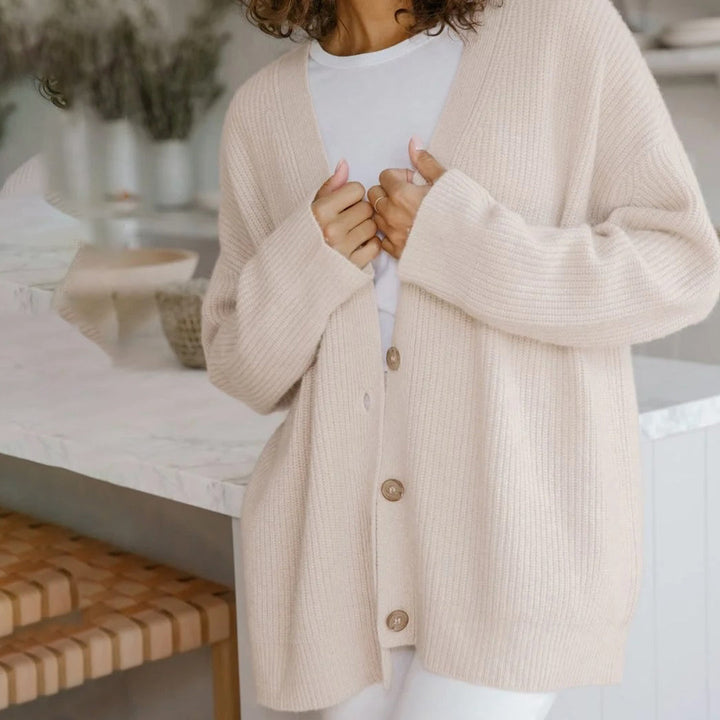 Winter essential women's oversized rib-knit cardigan, a cozy long open front design.