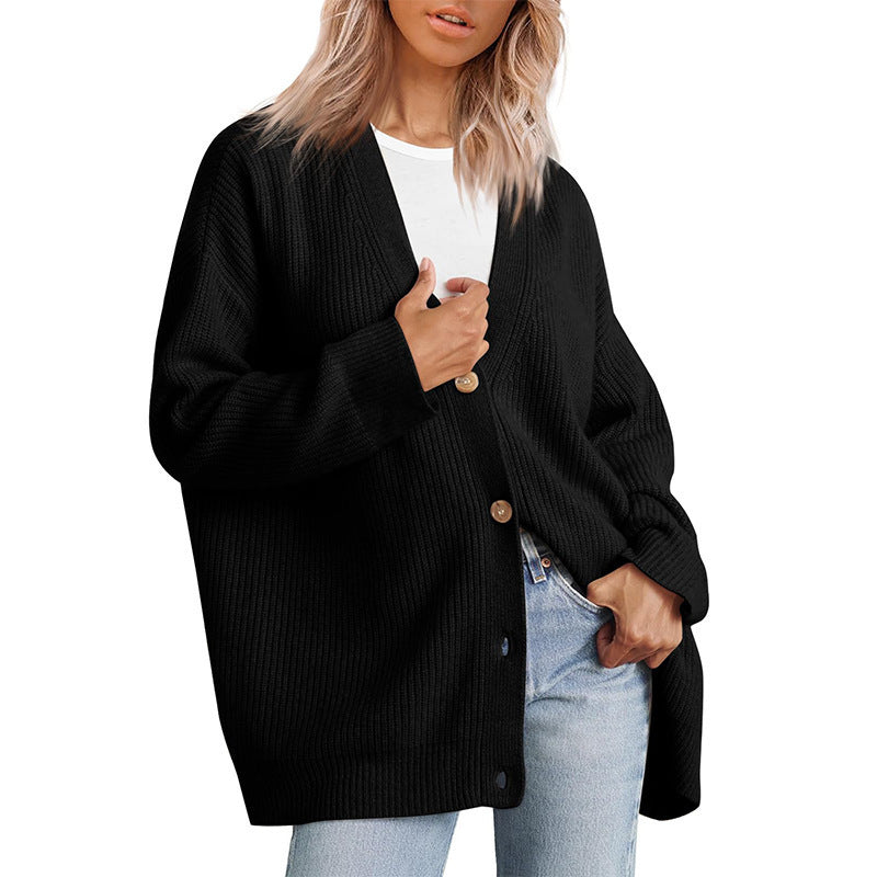Long oversized women's rib-knit cardigan, perfect for autumn layering and cozy comfort.