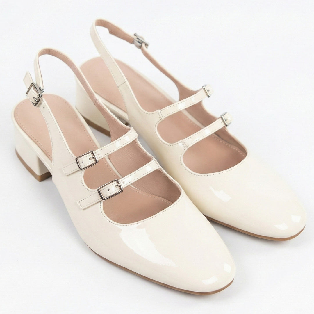 Elegant women's square toe Mary Jane heels with double straps. Chic block heel, perfect for work or dress.