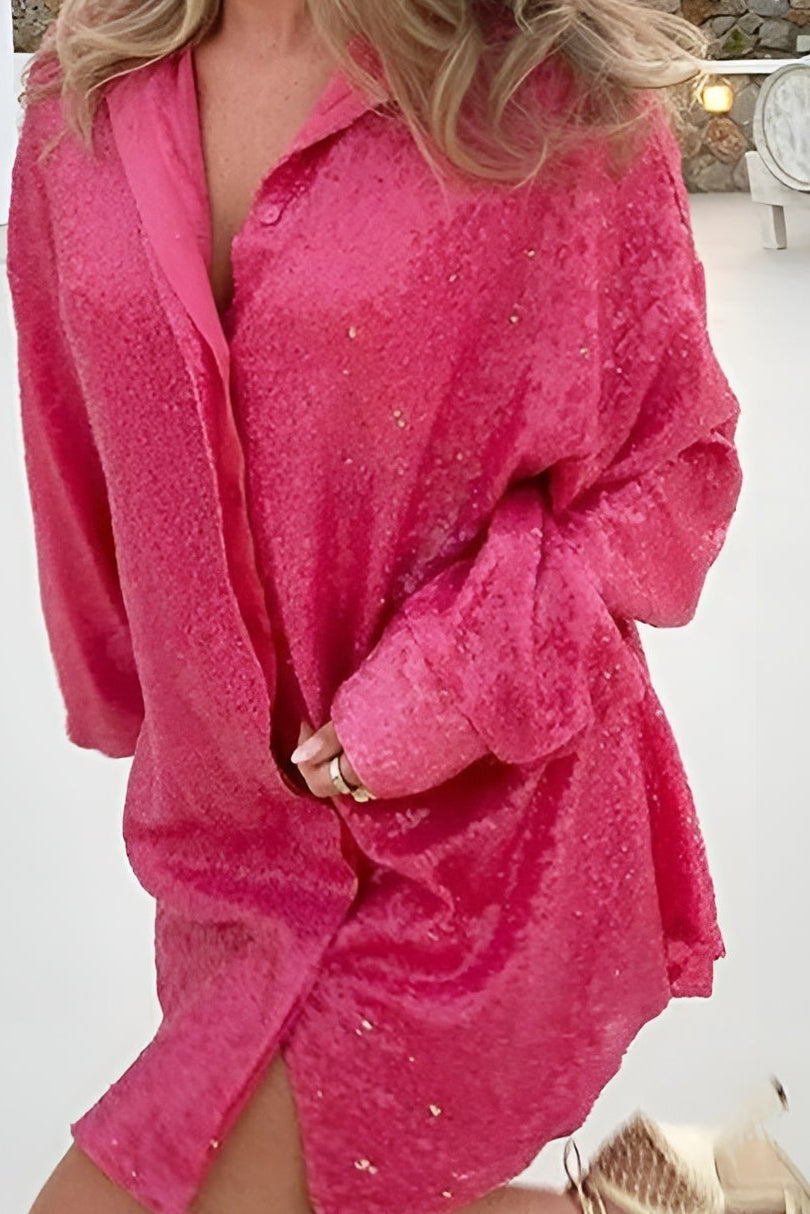 Chic women's oversized mini dress with glittering shimmer, long sleeves & stylish button-front closure.