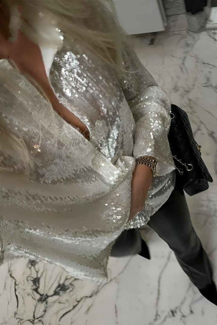 Glittering women's button-front shirt dress, a versatile long sleeve mini perfect for dazzling parties.