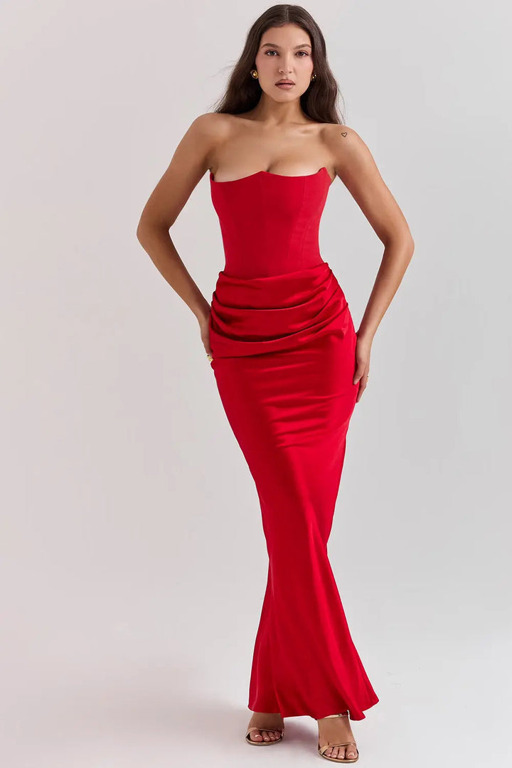 Flowing women's strapless maxi gown with a modern corset silhouette, very chic.