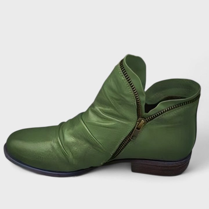 Stylish women's supportive ankle boots with orthopedic features. Comfortable winter footwear for elegant fashion.