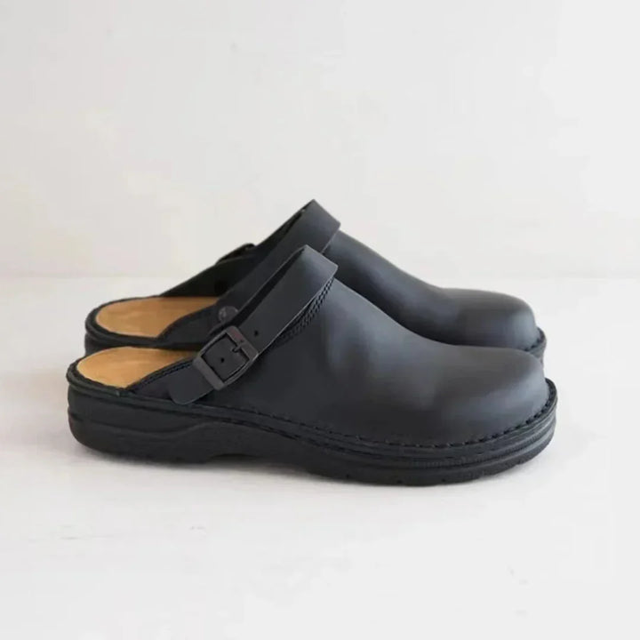 Versatile men's buckle strap clogs, perfect as slip-on house shoes or stylish casual outdoor footwear.