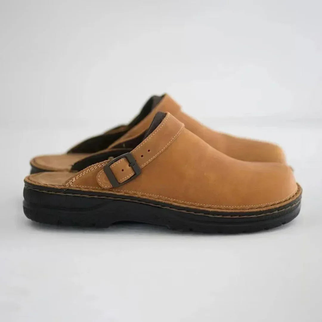Men's slip-on comfort clogs with adjustable buckle strap, ideal for relaxed indoor & outdoor casual wear.