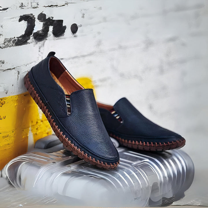 Versatile black men's slip-on shoes, combining premium comfort with a sleek, casual fashion look.