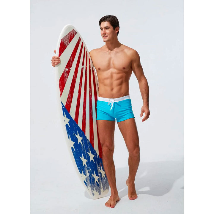 Men's modern swim shorts, designed for comfort with quick-dry fabric, perfect for summer.