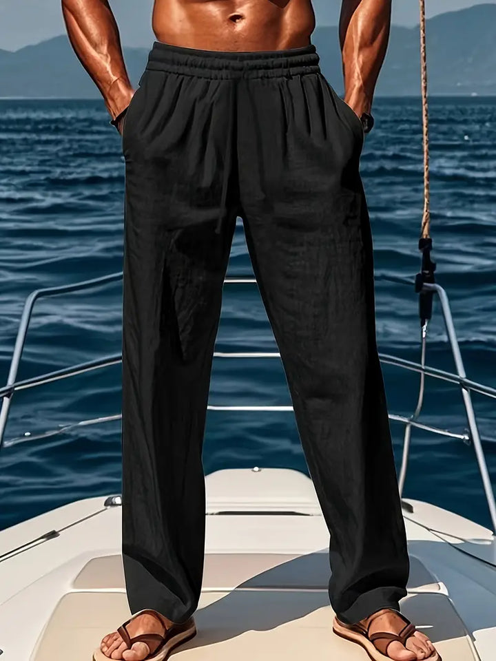 Stylish black men's relaxed fit comfort pants. Loose, versatile casual trousers for everyday.