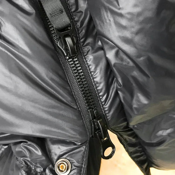 Warm & elegant women's quilted winter jacket with a comfortable hood.