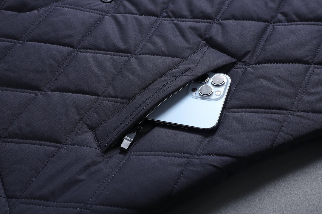 Versatile men's transition jacket, waterproof and quilted design for stylish all-season comfort. Essential everyday outerwear.