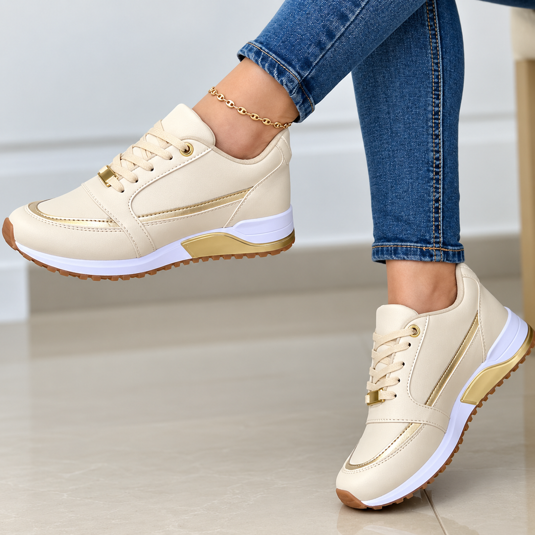 Stylish black lace-up platform sneakers for women, featuring chic metallic accents, perfect for trendy casual outfits.