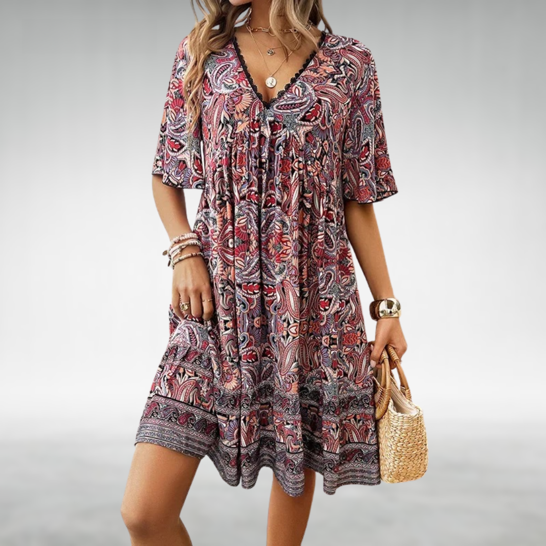 Elegant women's short V-neck bohemian print dress, featuring a flowy design for a stylish summer look.