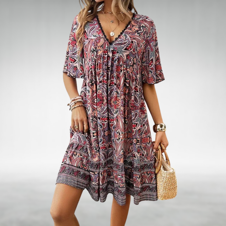 Elegant women's short V-neck bohemian print dress, featuring a flowy design for a stylish summer look.