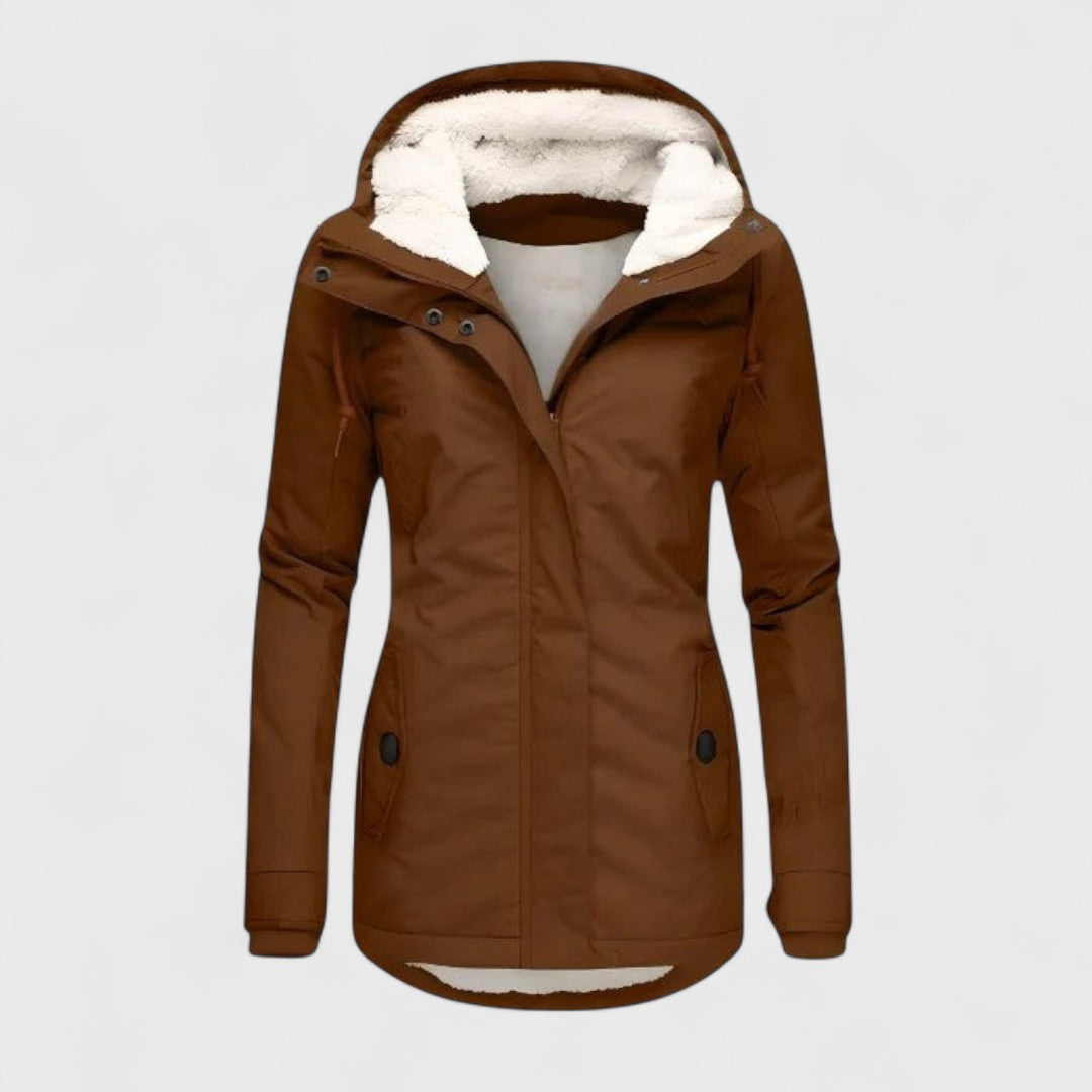 Long hooded women's winter coat, elegant & waterproof. Stay warm and cozy in cold, all-weather conditions.