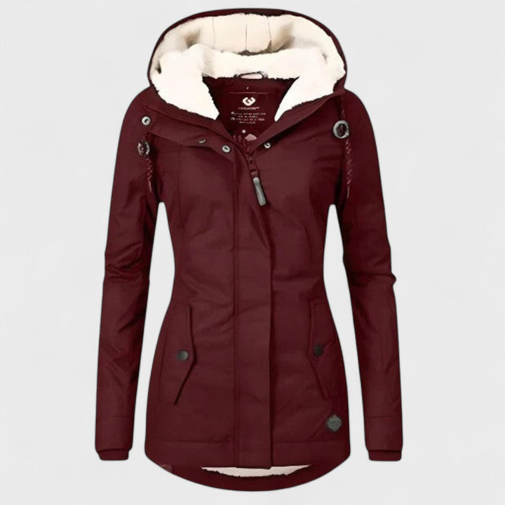All-weather women's waterproof winter coat. Stylish, warm & hooded, perfect for elegant cold weather protection.