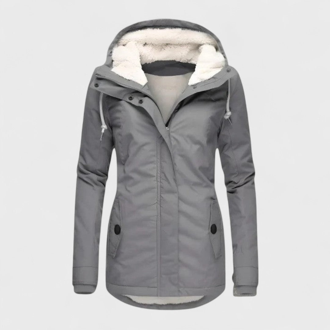 Elegant women's waterproof winter coat with hood, perfect for warmth & style in all cold weather conditions.