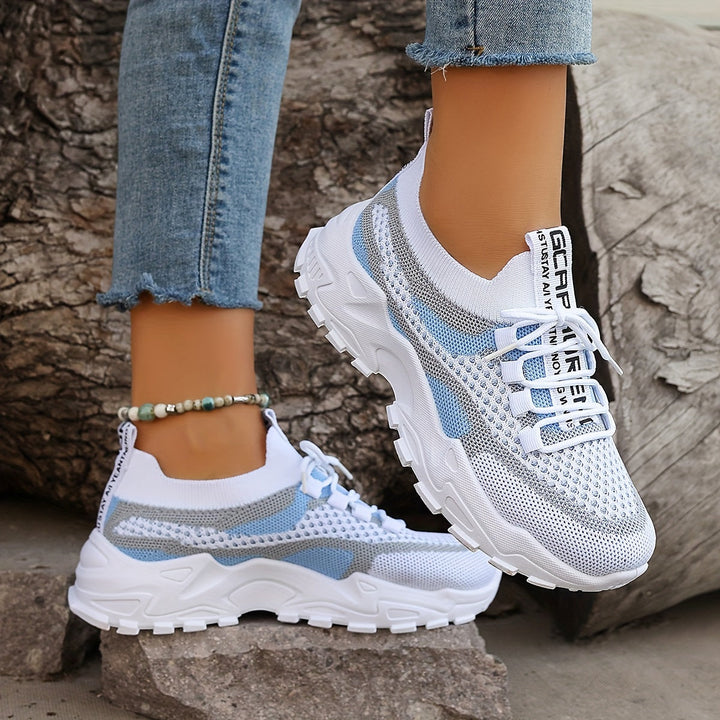 Non-slip pink ergonomic women's sneakers, ensuring safe walking & all-day comfort with arch support.