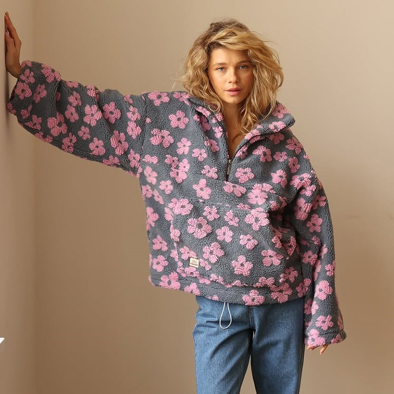 Model showcasing a women's floral quarter zip pullover sweater, ideal for comfortable casual wear.