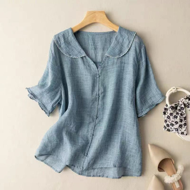 Feminine women's vintage top with elegant button accents and long sleeves, ideal for spring & autumn casual style.