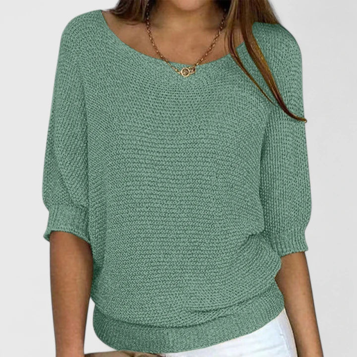 Stylish women's knit pullover, versatile long-sleeve jumper for elegant casual wear and winter fashion.